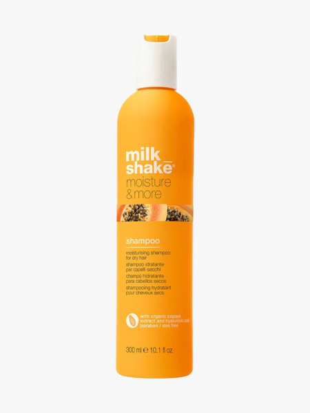Milk_Shake Moisture & More Shampoo orange bottle on light gray background